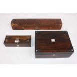 An early 19th century rosewood and mother of pearl inlaid box, w.23cm; together with a Victorian