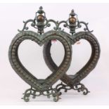 A pair of modern verdigris metal heart shaped lanterns, h.52c,