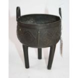 A Chinese bronze tripod censer, h.15cm Slightly bent out of shape.