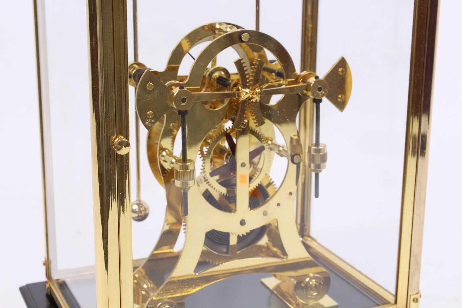 A 20th century brass skeleton clock, the enamelled chapter ring showing Roman numerals, having - Image 3 of 3