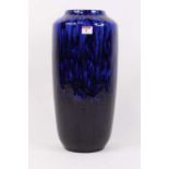 A 1970s West German pottery vase, having a mottled blue glaze, h.44cm