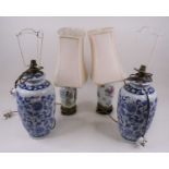A pair of Chinese blue and white table lamps, each h.42cm (excluding fittings); together with