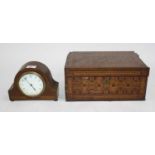 An Edwardian mahogany and chequer strung cased mantel clock, having a convex enamelled dial with