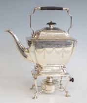 An Edwardian silver spirit kettle on stand, of rectangular form with canted corners, having all-over