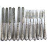 A set of Victorian silver dessert knives and forks, in the rare Newton pattern, comprising six