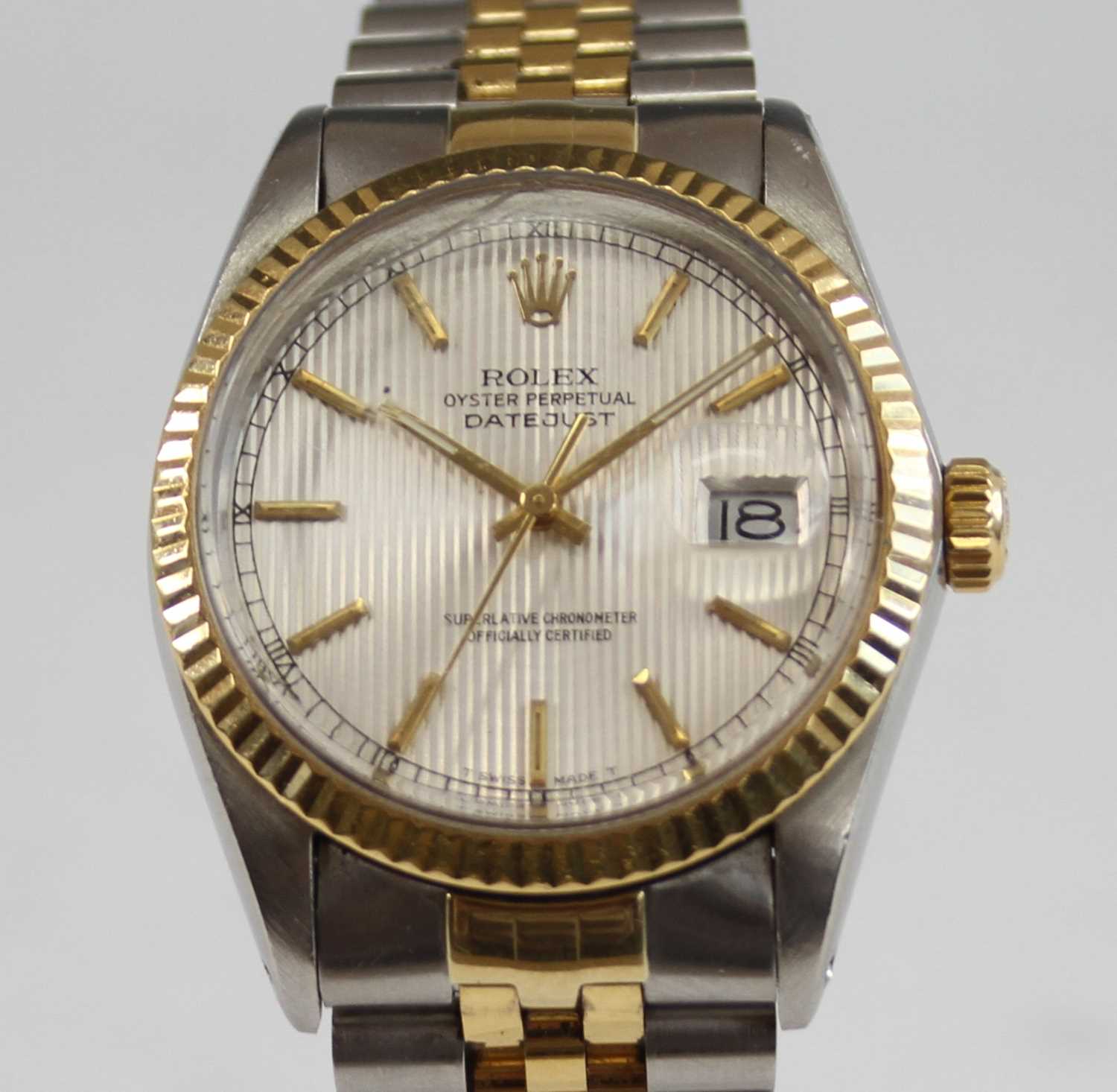A bi-metal Rolex Oyster Perpetual Datejust automatic wristwatch, having a cream tapestry index dial,