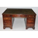 A 19th century mahogany twin pedestal partner's desk, the top having gilt tooled leather inset