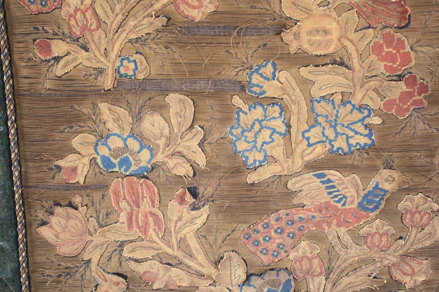 A 17th century silkwork appliqué panel, having tent-stitched silkwork birds upon flowering - Image 5 of 9