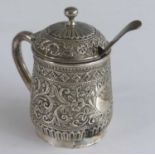 A Victorian silver lidded mustard, in the form of a baluster tankard with single handle and ball