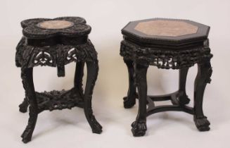 A Chinese carved hardwood marble topped squat jardiniere, of shaped circular form with beaded edge