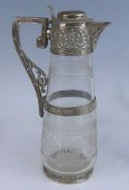 A Victorian silver mounted and cut glass claret jug, the glass body of low baluster form with