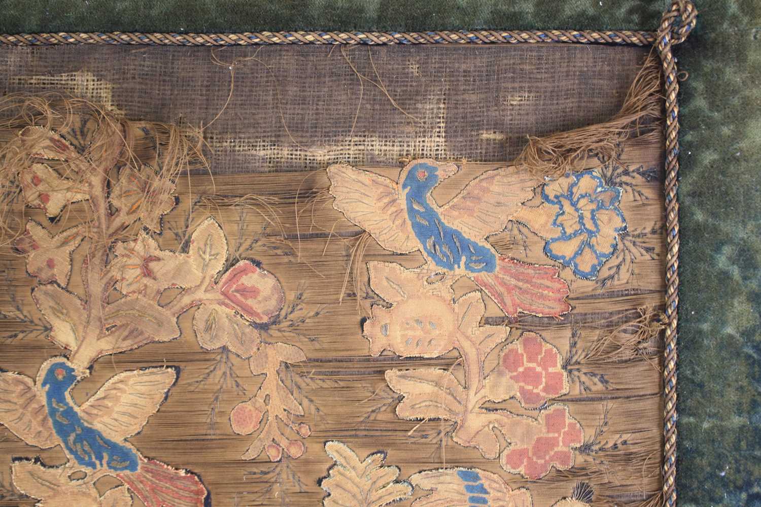 A 17th century silkwork appliqué panel, having tent-stitched silkwork birds upon flowering - Image 3 of 9