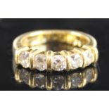 An 18ct yellow gold diamond half eternity ring, featuring five round brilliant cut diamonds in bar