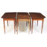 A George III mahogany double D-end dining table, the centre section having twin fall leaves, the