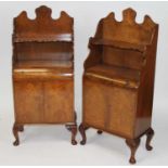 A near-pair of walnut bookcases in the Queen Anne taste, each having a single frieze drawer over
