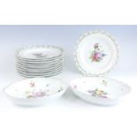 A set of eleven Royal Copenhagen porcelain plates, circa 1870-1890, each decorated in the 'Saxon