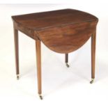 A Sheraton Revival mahogany and inlaid Pembroke table by Edwards & Roberts, having oval fall leaves,