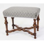 A walnut framed dressing stool in the William & Mary style, having stuffover seat, the turned and