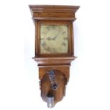 Richard Quinton of Downton – an 18th century oak cased wall clock, having a 10” square brass dial,