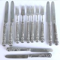 A George IV silver set of dessert knives and forks, comprising six cake forks and six cake knives,