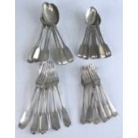 A harlequin suite of Victorian silver flatware, in the Fiddle pattern with engraved armorial