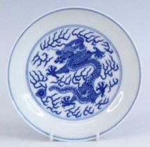 A Chinese blue and white porcelain dish, Daoguang period, decorated with a five clawed dragon