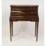 A circa 1900 French Empire style mahogany and brass bureau de dame, having a veined rouge marble top