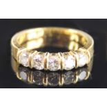 An 18ct yellow gold diamond half eternity ring, comprising five round brilliant cut diamonds in