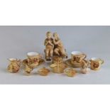 James Hadley for Royal Worcester, a blush ivory figure group of 'Goldsmith's Boys', having gilt