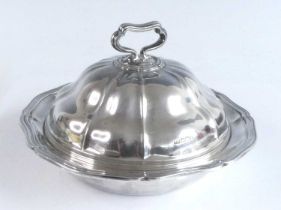 A late Victorian silver muffin dish and cover, of shaped melon form with contoured reeded rims and