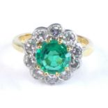An 18ct yellow and white gold, emerald and diamond circular cluster ring, comprising a centre