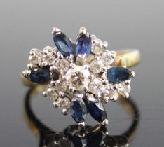 An 18ct yellow and white gold, sapphire and diamond abstract cluster ring, comprising six marquise