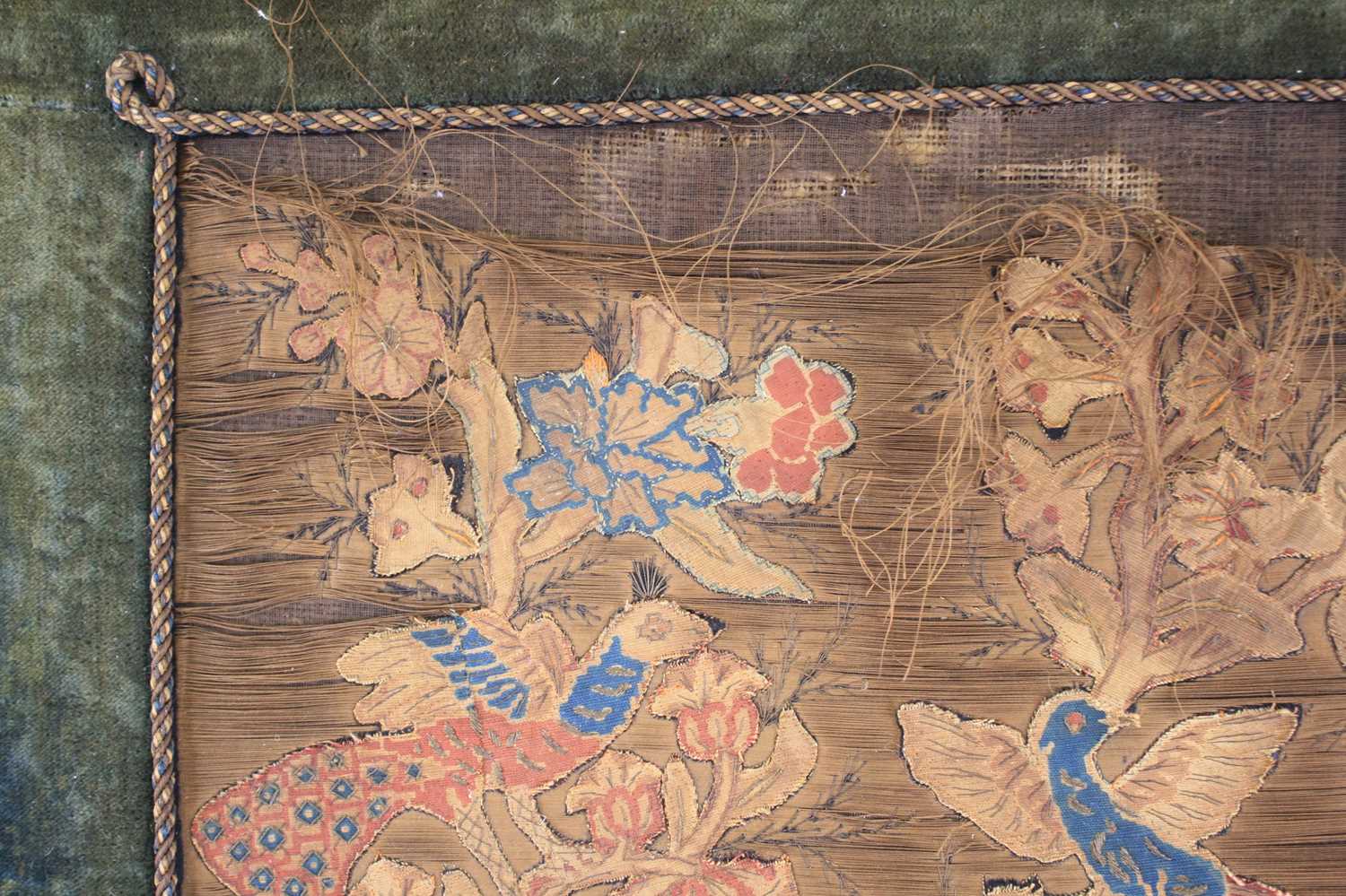 A 17th century silkwork appliqué panel, having tent-stitched silkwork birds upon flowering - Image 2 of 9