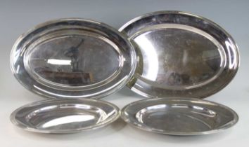 A Christofle of France silver plated oval serving platter, having a raised and reeded rim, stamped