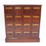 A mahogany chemist's chest, arranged as four flights of four drawers, each being annotated, w.