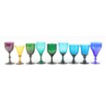 A collection of coloured drinking glasses, 19th century and later, to include Bristol blue, amethyst