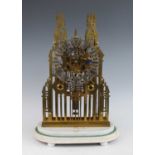 A Victorian brass Gothic influence skeleton clock under glass dome, having a silvered Roman