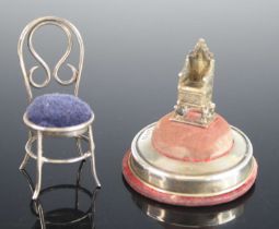 A late Victorian silver novelty pin cushion in the form of a chair, the balloon-back with inset