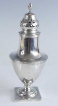 A George V silver sugar sifter, of plain pedestal baluster form to a square base, the removable