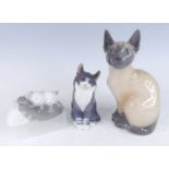 A Royal Copenhagen porcelain model of a seated Siamese cat, printed marks and numbered 3281 verso,