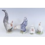 A collection of four Royal Copenhagen porcelain models, to include cockerel, numbered 1025, h.