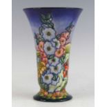 A Moorcroft England pattern pottery vase, circa 1994, of trumpet form, undeglaze painted and tube
