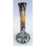 A contemporary Moorcroft Flames of the Phoenix pattern pottery specimen vase, the slender neck to