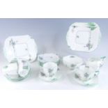 A collection of Art Deco Shelley bone china Tall Trees pattern tea wares, to include a pair of