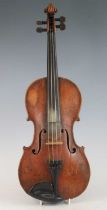 A Continental violin, having a one piece maple back and spruce table with ebony finger board and