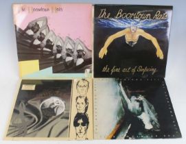 A collection of assorted LPs, various dates and genres to include The Jam - Dig The New Breed, The