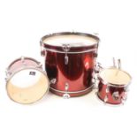 A CB Drums SP Series five piece drum kit, in red finish with cymbals and accessories.