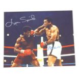 Leon Spinks (1953-2021) and Muhammad Ali (1942-2016), a colour photograph of the boxers during their