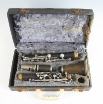 A Boosey and Hawkes "77" four piece clarinet, serial no. 128687, in fitted case.