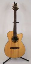 An Eagle Rose six string acoustic guitar, the shaped and mother of pearl inlaid headstock having